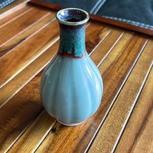 Small bud vase. Decor. Markings. Picture show blue, it is more of a moss green.​